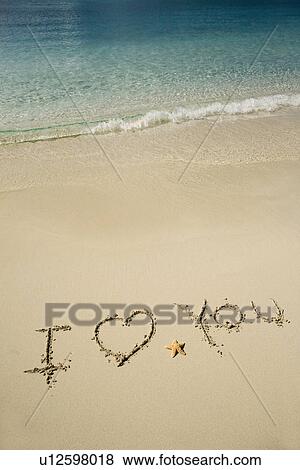 Stock Photo - I Love You written in sand. Fotosearch