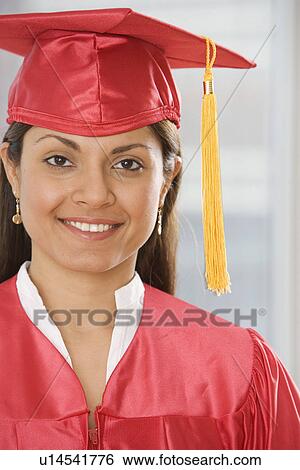 Indian woman wearing graduation cap and gown View Large Photo Image Stock Photograph - Indian woman wearing graduation cap and gown. Fotosearch