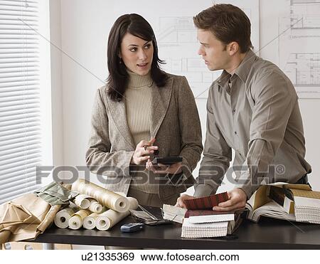 Interior designers working at shop View Large Photo Image Stock Photo - Interior designers working at shop. Fotosearch
