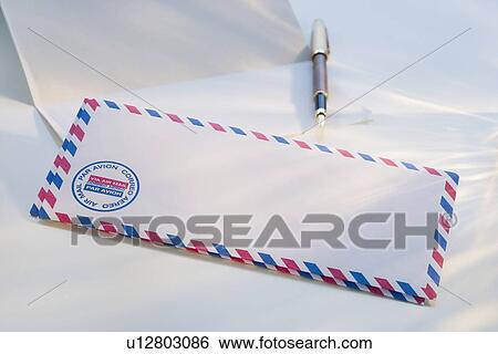 Stock Photograph - International envelope and pen. Fotosearch