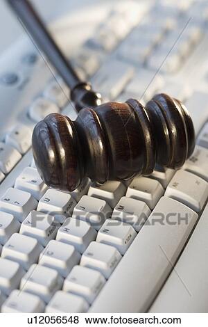 Judge’s gavel on computer keyboard View Large Photo Image Stock Photo - Judge’s gavel on computer keyboard. Fotosearch