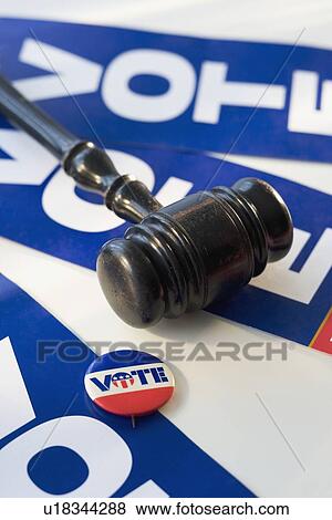 Judge’s gavel on vote signs View Large Photo Image Stock Photo - Judge’s gavel on vote signs. Fotosearch