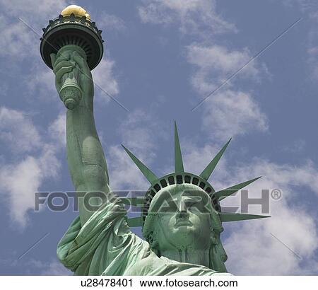 Stock Image - Low angle view of Statue of Liberty. Fotosearch