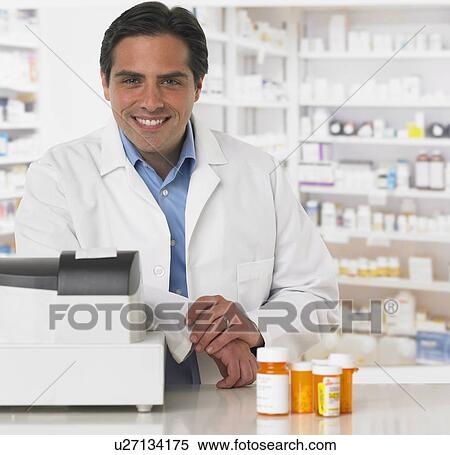 Male pharmacist at counter with medication View Large Photo Image Stock Photography - Male pharmacist at counter with medication. Fotosearch
