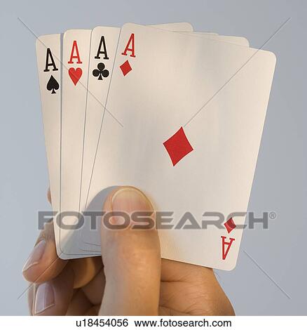 Man holding four aces View Large Photo Image Stock Photograph - Man holding four aces. Fotosearch