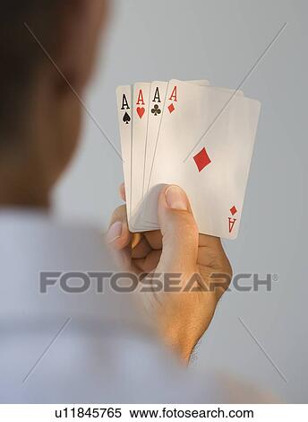 Man holding four aces View Large Photo Image Stock Photography - Man holding four aces. Fotosearch