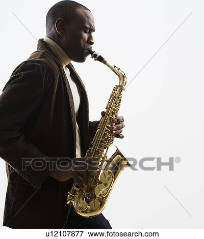 Stock Photo - Man playing saxophone. Fotosearch