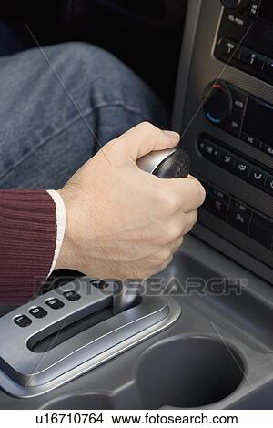 Man shifting automatic car View Large Photo Image Picture - Man shifting automatic car. Fotosearch