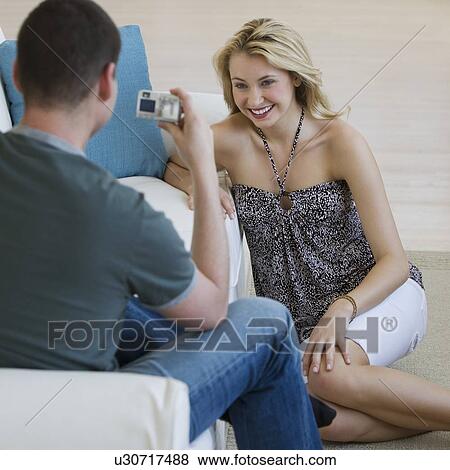 Man taking girlfriend’s photograph View Large Photo Image Stock Photo - Man taking girlfriend’s photograph. Fotosearch