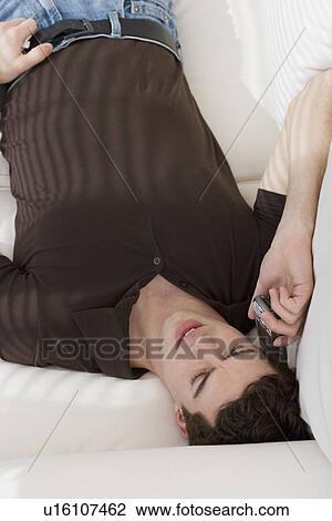 Stock Image - Man talking on cell phone. Fotosearch