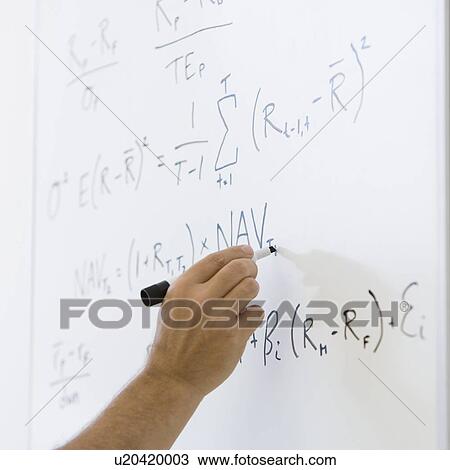 Man writing formulae on whiteboard View Large Photo Image Stock Image - Man writing formulae on whiteboard. Fotosearch