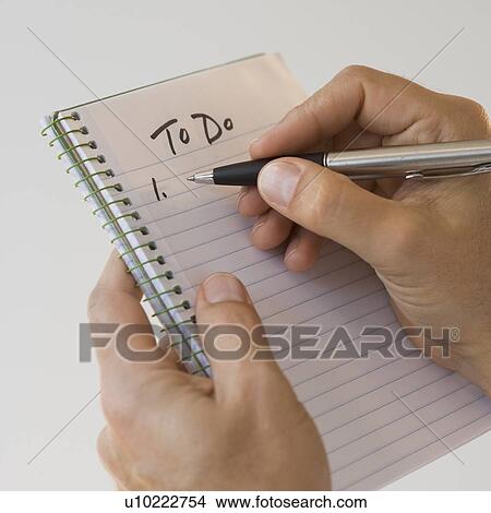 Man writing to do list View Large Photo Image Picture - Man writing to do list. Fotosearch