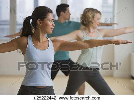 Multi-ethnic people in yoga class View Large Photo Image Stock Image - Multi-ethnic people in yoga class. Fotosearch