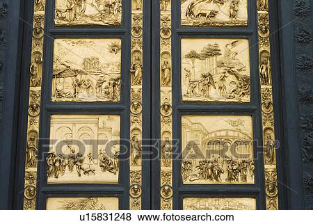Stock Photo - Ornate doors on The Gates of Paradise, Florence, Italy. Fotosearch