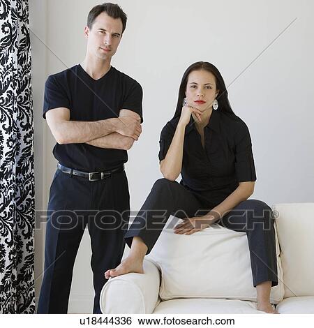 Stock Photograph - Portrait of couple indoors. Fotosearch