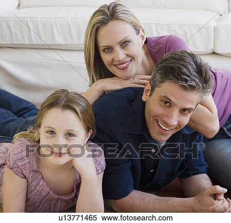 Portrait of family on floor View Large Photo Image Stock Photography - Portrait of family on floor. Fotosearch