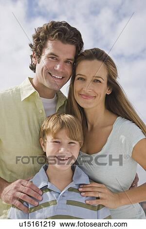 Portrait of family with one child View Large Photo Image Stock Photo - Portrait of family with one child. Fotosearch