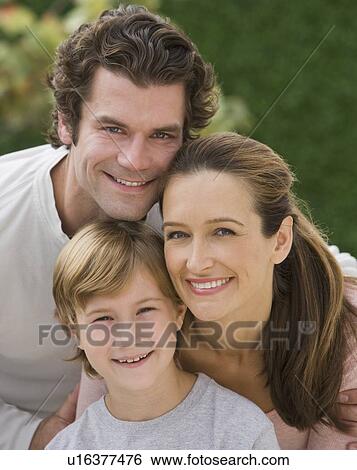 Stock Photograph - Portrait of family with one child. Fotosearch