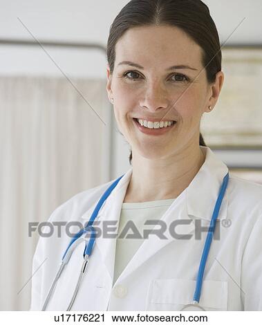 Stock Image - Portrait of female doctor. Fotosearch
