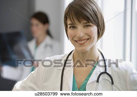 Stock Photo - Portrait of female doctor. Fotosearch