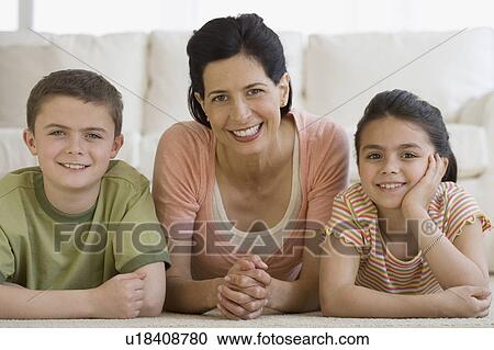 Stock Image - Portrait of mother and children. Fotosearch