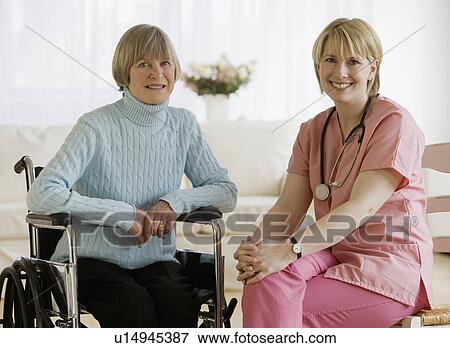 Stock Photo - Portrait of nurse and senior woman. Fotosearch