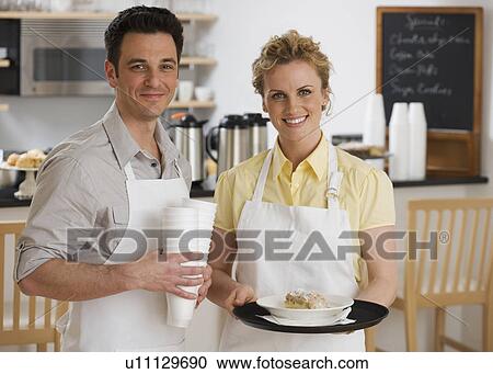 Portrait of wait staff in cafe View Large Photo Image Stock Image - Portrait of wait staff in cafe. Fotosearch
