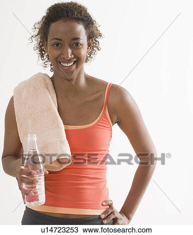 Portrait of woman wearing athletic gear View Large Photo Image Stock Image - Portrait of woman wearing athletic gear. Fotosearch