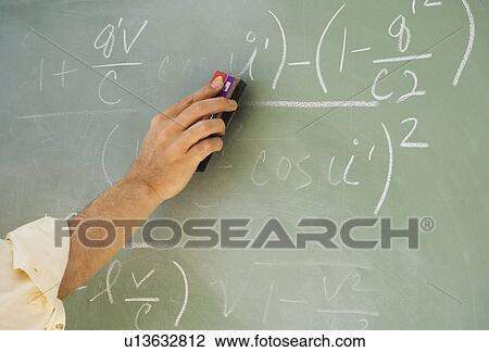 Professor erasing formulae on blackboard View Large Photo Image Stock Image - Professor erasing formulae on blackboard. Fotosearch