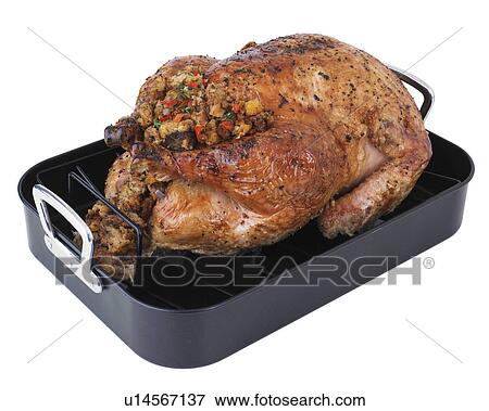 Stock Photo - Roasted turkey in pan. Fotosearch