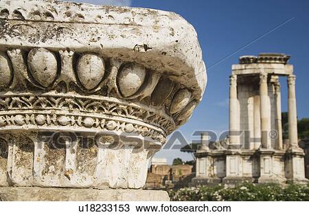 Roman column with Temple of Vesta in background, Roman Forum, Italy View Large Photo Image Stock Image - Roman column with Temple of Vesta in background, Roman Forum, Italy. Fotosearch