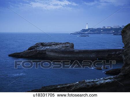 Scenic view of cliffs and lighthouse, Biarritz, France View Large Photo Image Stock Photography - Scenic view of cliffs and lighthouse, Biarritz, France. Fotosearch