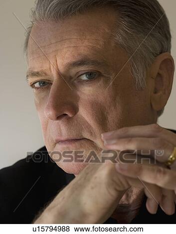 Senior man with hands clasped View Large Photo Image Stock Photo - Senior man with hands clasped. Fotosearch