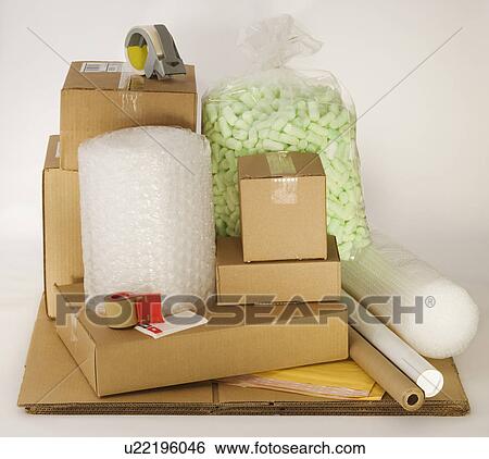 Stock Photograph - Shipping boxes and packing supplies. Fotosearch