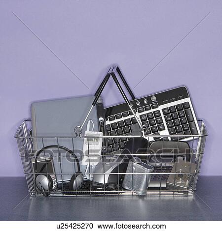 Shopping basket filled with electronics View Large Photo Image Stock Image - Shopping basket filled with electronics. Fotosearch