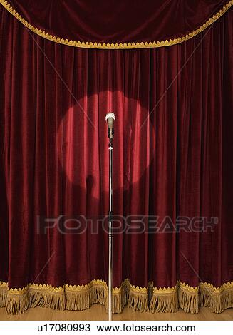 Spotlight on microphone on stage View Large Photo Image Stock Image - Spotlight on microphone on stage. Fotosearch