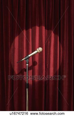 Spotlight on microphone on stage View Large Photo Image Stock Photograph - Spotlight on microphone on stage. Fotosearch