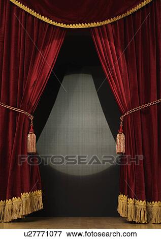 Spotlight on open stage curtains View Large Photo Image Stock Photo - Spotlight on open stage curtains. Fotosearch