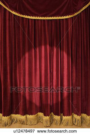 Spotlight on stage curtain View Large Photo Image Stock Photo - Spotlight on stage curtain. Fotosearch