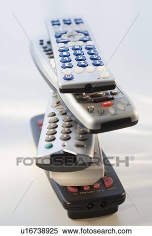 Stock Photography - Stack of remote controls. Fotosearch
