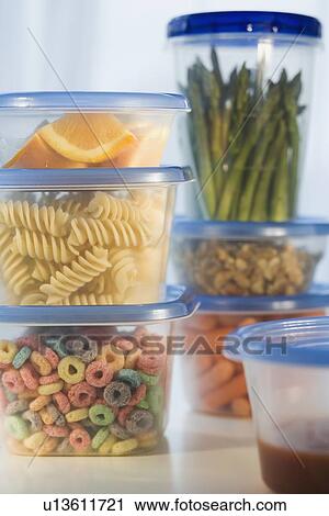 Stacked plastic containers of food View Large Photo Image Stock Image - Stacked plastic containers of food. Fotosearch
