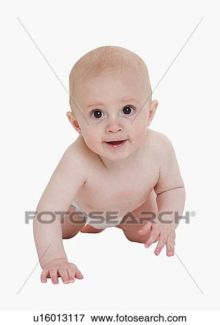 Studio shot of baby crawling View Large Photo Image Stock Photo - Studio shot of baby crawling. Fotosearch