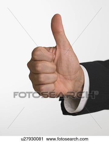 Studio shot of businessman's hand giving thumbs up View Large Photo Image Stock Image - Studio shot of businessman's hand giving thumbs up. Fotosearch