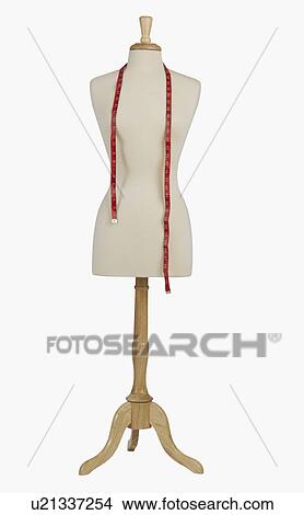 Picture - Studio shot of dress dummy and tape measure. Fotosearch
