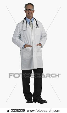 Studio shot of male doctor with hands in pockets View Large Photo Image Stock Photo - Studio shot of male doctor with hands in pockets. Fotosearch