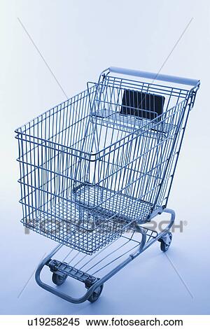 Stock Photography - Studio shot of shopping cart. Fotosearch