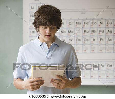 Teenaged boy giving speech in science class View Large Photo Image Stock Photography - Teenaged boy giving speech in science class. Fotosearch