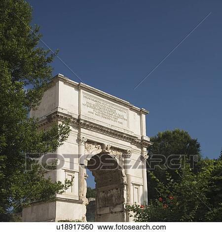 The Arch of Titus under blue sky, Roman Forum, Italy View Large Photo Image Stock Image - The Arch of Titus under blue sky, Roman Forum, Italy. Fotosearch
