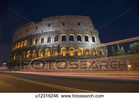 Stock Photograph - The Colosseum at night, Italy. Fotosearch