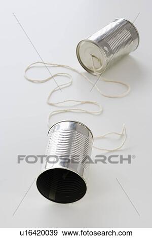 Tin cans connected by string View Large Photo Image Stock Photo - Tin cans connected by string. Fotosearch